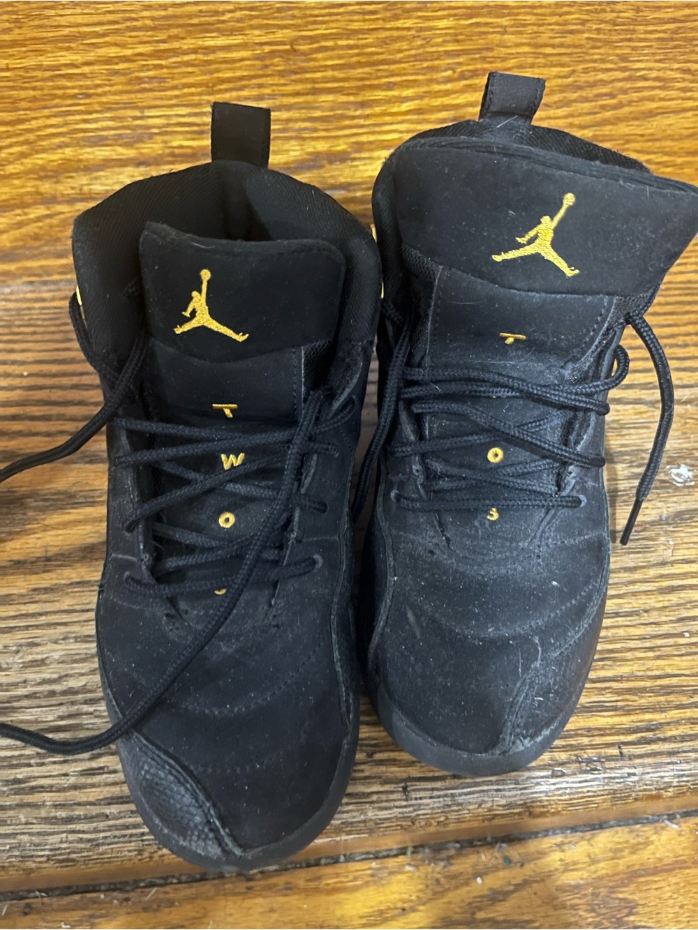 Jordan Black Sneakers with Gold Accents
